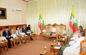 陈海大使会见缅甸联邦选举委员会主席哥哥-千博